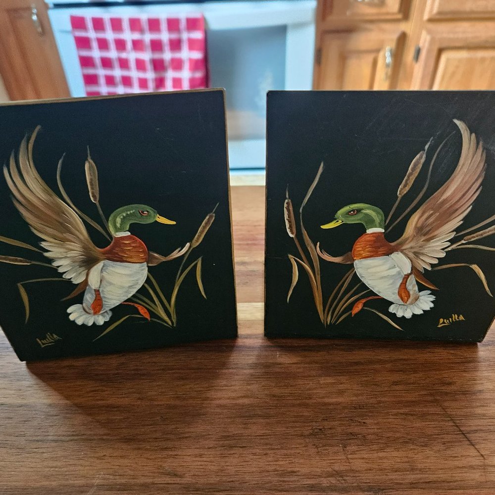 vintage hand painted metal bookends signed by artist